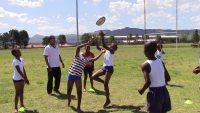 Queenian and First Rugby Team Player, Kenan Richards, leading a session at Nonesi Primary School in March 2017